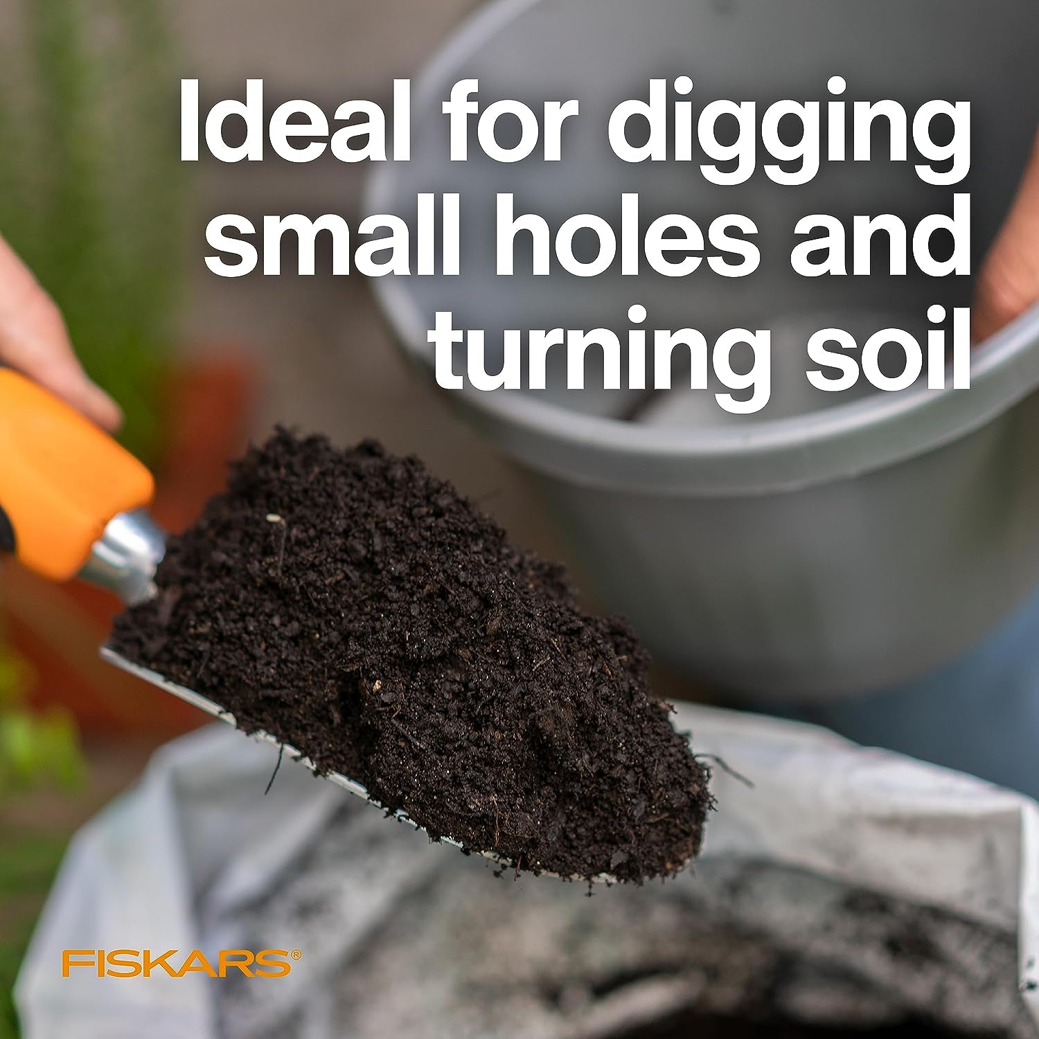 Fiskars Ergo Garden Trowel for Digging and Planting, Heavy Duty Gardening Hand Tool with Hanging Hole