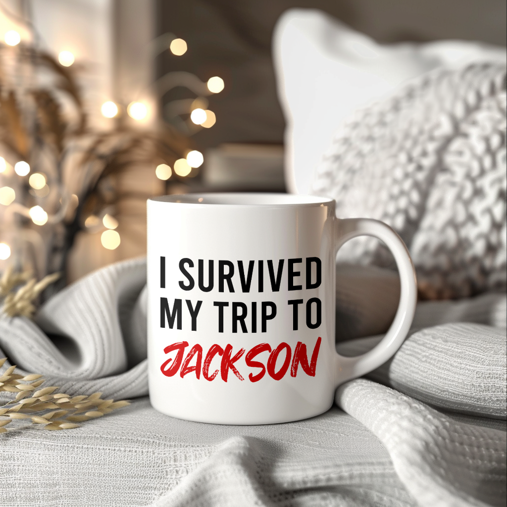 Funny Travel Mug – I Survived My Trip to Jackson, 11oz or 15oz White Ceramic Coffee Mug, Novelty Travel Gift