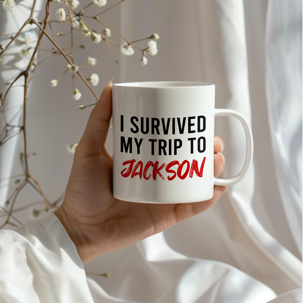 Funny Travel Mug – I Survived My Trip to Jackson, 11oz or 15oz White Ceramic Coffee Mug, Novelty Travel Gift